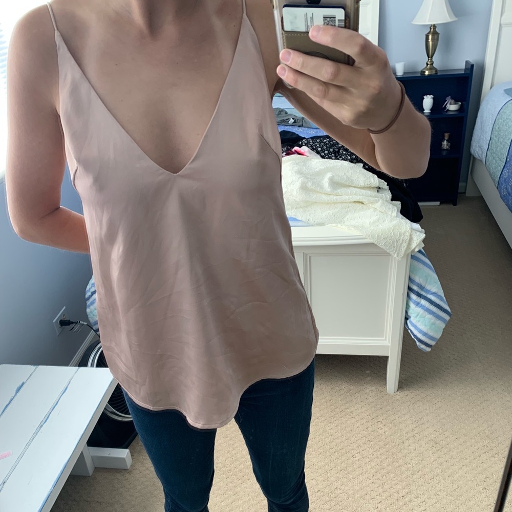 Shimmery champagne spaghetti strap top.